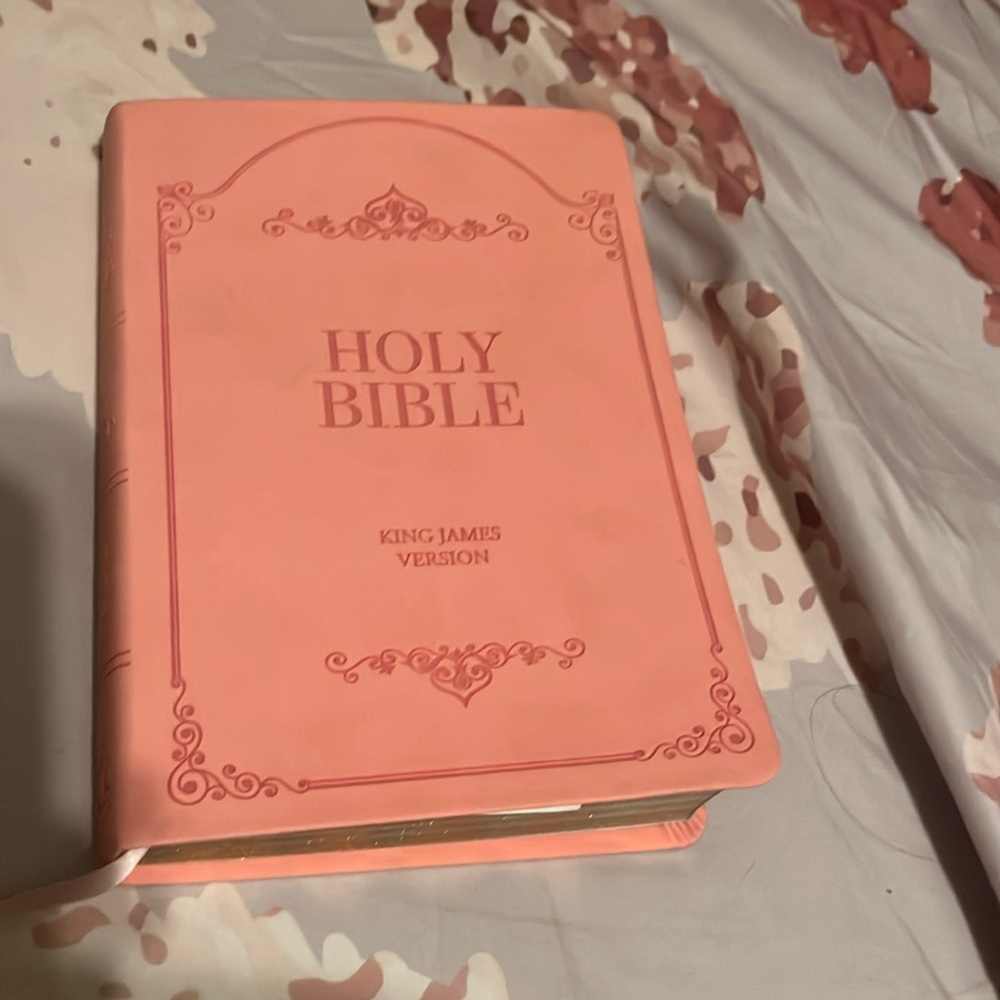 Pink bible gold and white pages